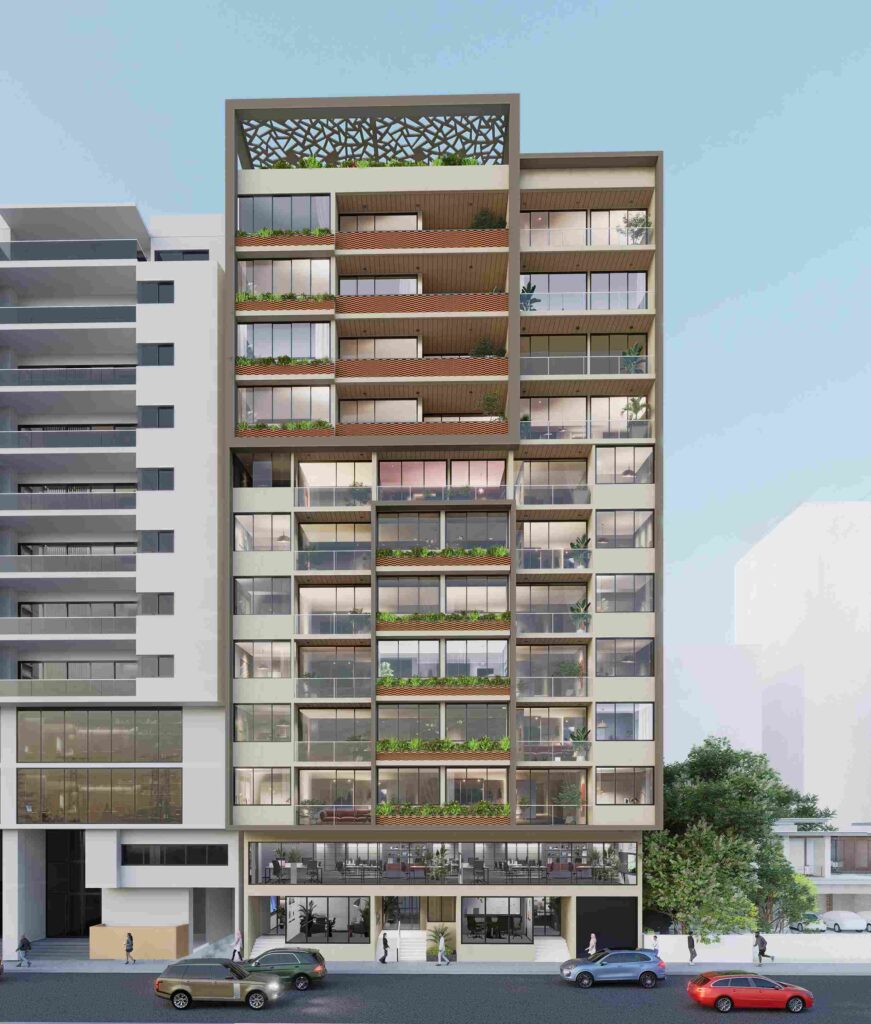 vue principale de la façade et des commerces au rez-de-chaussée de la résidence Douta Seck à Dakar