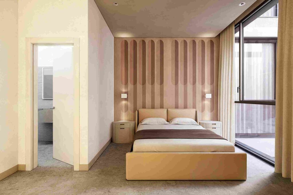 vue de la chambre F3 appartement B de la résidence Rahma. Un lit simple et deux tables de chevets
